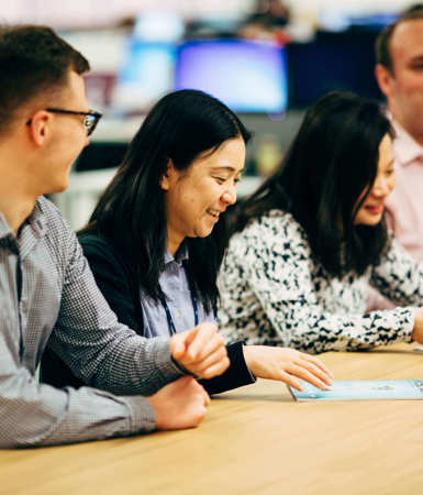 people sat discussing services related to the environment standard